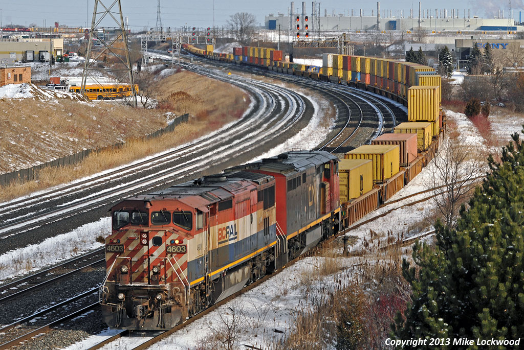 A pair of saggin' wagons, BCOL 4603 and CN 2451, make 149's tailend lift out of the yard at Oshawa, Ontario. Though always a worthy chase, BCOL leaders are common enough on the Kingston Sub to not be foam-inducing anymore. 1324hrs.