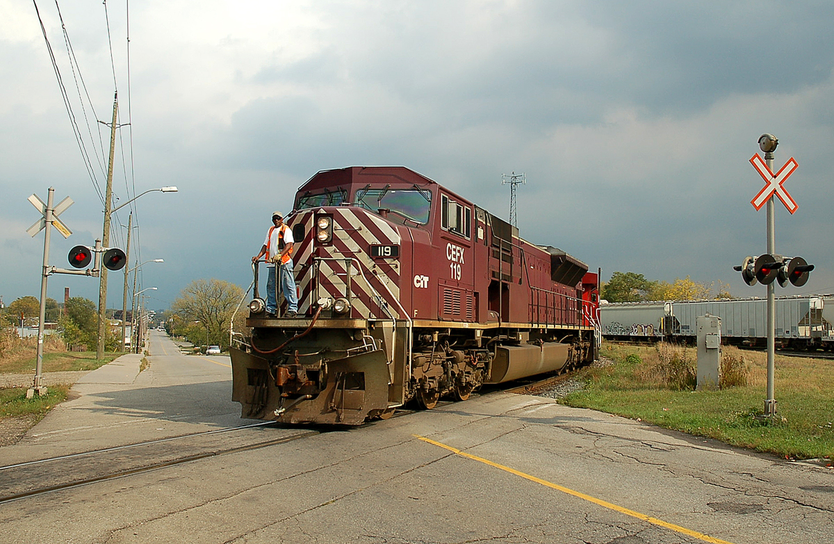An eastbound CP train with CP 8813 - CEFX 119 heading down to the lower yard to lift some cars