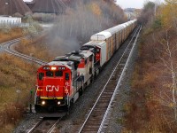 CN 148 about to pass under the Wayne Gretzky Parkway with CN 2122 - BCOL 4608 - CN 5674 showing the way