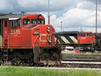 Laid off and out of work due to an economic downturn, CN 5515 and 5547 are just two of the dozens of locomotives stored at MacMillan Yard, coupled together and crammed onto every piece of available track around the diesel shop. They would eventually be put back to work, but for now sit parked together, unneeded by their owner.
<br><br>
<i>Your daily lesson on locomotives</i>: Both units pictured are SD60F models, a unique CN-only model derived from the standard SD60 and built by General Motors Diesel that featured a full-width cowl carbody with rear visibility tapering behind the cab, nicknamed the "Draper Taper" design (after William L. Draper, a CN Assistant Chief of Motive Power at the time). While other contemporary CN orders featured similar Draper Taper carbodies, it never really caught on en masse, and CN later reverted to more contemporary builder designs.
<br><br><i>Class dismissed</i>.