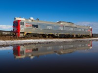 <b>Lookin' Good Budd</b>. Built in 1958, this venerable Budd RDC1 has finished its work for the day and rests at Stuart Street Yard in Hamilton. The reflection was made possible due to some wet snow that fell overnight and accentuated with a wide lens. 