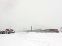 As the blizzard continues, CN 382 (CN 5793-2436 GTW 4626) scoops CN 509 on the north track as 509 continues to dig out the Walker's siding crossovers. CN 509 would normally be easily visible from this angle, but the big snowflakes made for poor visibility. 