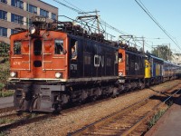 CN electric box cabs 6710 and 6712 pull VIA 6541 and train 135 through the Mont Royal station, also note the RDC on the tail end.  Electric units were used to pull diesel powered trains through the Mont Royal tunnel, due to the build up of exhaust in the 3.1 mile long tunnel.