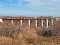 An extra dimensional move from Mac Yard to Hamilton is seen crossing the Credit River Bridge with a pair of old horses for power. 