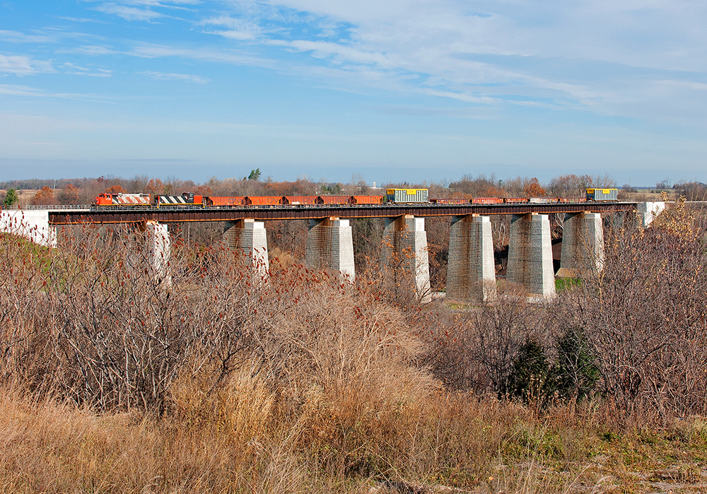 An extra dimensional move from Mac Yard to Hamilton is seen crossing the Credit River Bridge with a pair of old horses for power.