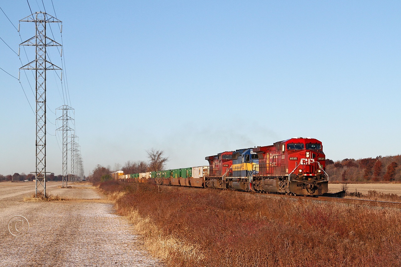 The first of 3 back to back eastbounds sees CP 8535 with ICE 6429 and CP 9760 power 9700' train 240 at mile 99 on the CP's Windsor Sub. Immediately following would be train 254 and T29, the Chatham way freight.