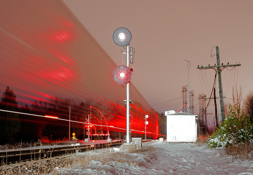 Knocking down the clear signal at the east end of Cherrywood siding, CP 3111 and 8249 muscle the Oshawa Turn westbound with multi's loaded with new GM cars to Agincourt Yard.