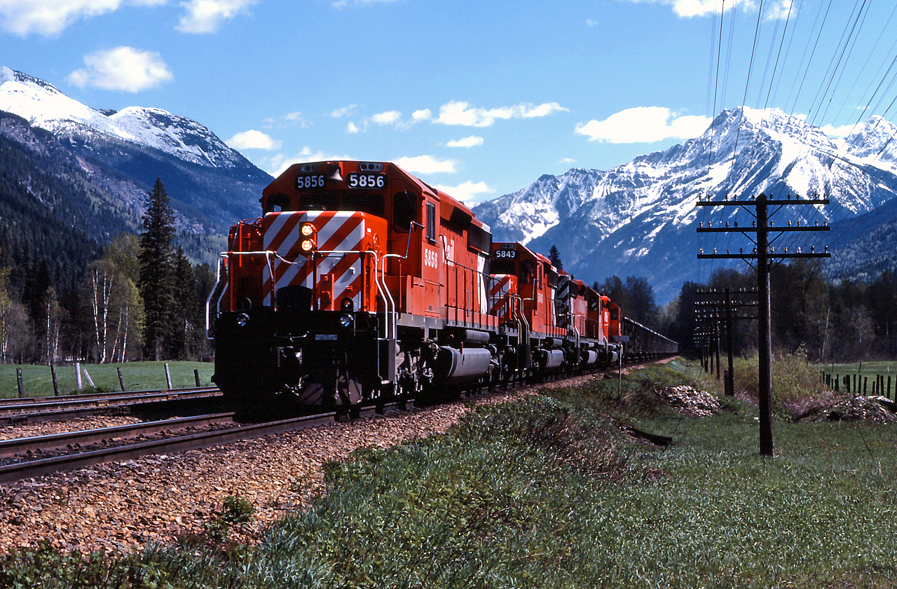 CP train 605 cruises through Greely, about 6 miles away from Revelstoke where the crew will get some much deserved rest.  Having conquered Rogers Pass, hundreds of miles of challenging terrain still lie ahead for train 605 before reaching the west coast; including Notch Hill on the Shuswap Sub and the treacherous Thompson and Fraser Canyons.