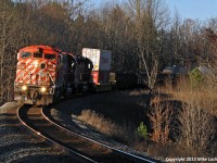 Was a bit of a drive up from Toronto, but the worth it to catch a barn leading an SD60 and an SD40-2. CP 9004, 6248, and 6016 curve through the hills north of Barrie heading towards a meet with 113 at Craighurst. 1536hrs.