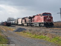 CP 9708 and 9661 make time with 608's train along the Belleville Sub's Darlington siding as snow squalls roll through the area. 1348hrs.