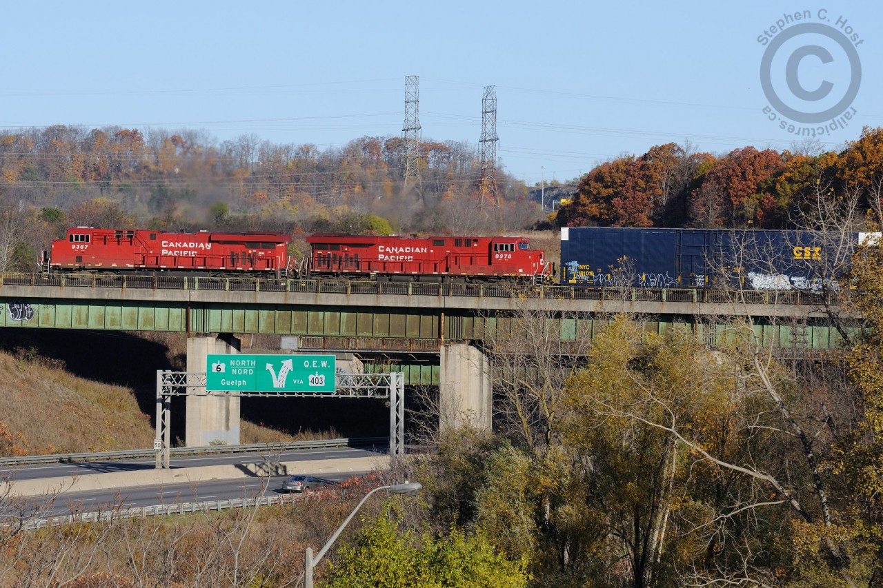CP Train 247 crosses over the Kings Highway 403 at Hamilton - the beginning of the up-grade climb to Guelph Junction.