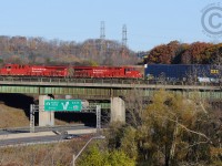 CP Train 247 crosses over the Kings Highway 403 at Hamilton - the beginning of the up-grade climb to Guelph Junction.