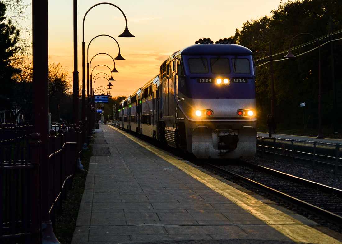 AMT 1324 leads a deadhead train eastbound through Montreal West on its way downtown. For more train photos, check out http://www.flickr.com/photos/mtlwestrailfan/