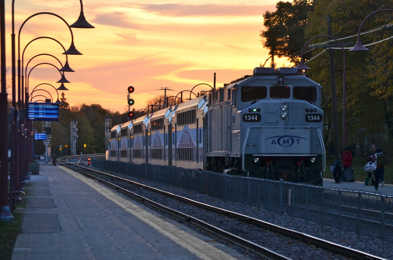 AMT 89 makes its stop at Montreal West at sunset before continuing on its way to Candiac on the south shore. For more train photos, check out http://www.flickr.com/photos/mtlwestrailfan/