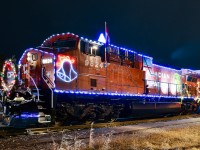 CP 9824 is in charge of CP's U.S. Holiday train at Delson, Quebec. For more train photos, check out http://www.flickr.com/photos/mtlwestrailfan/