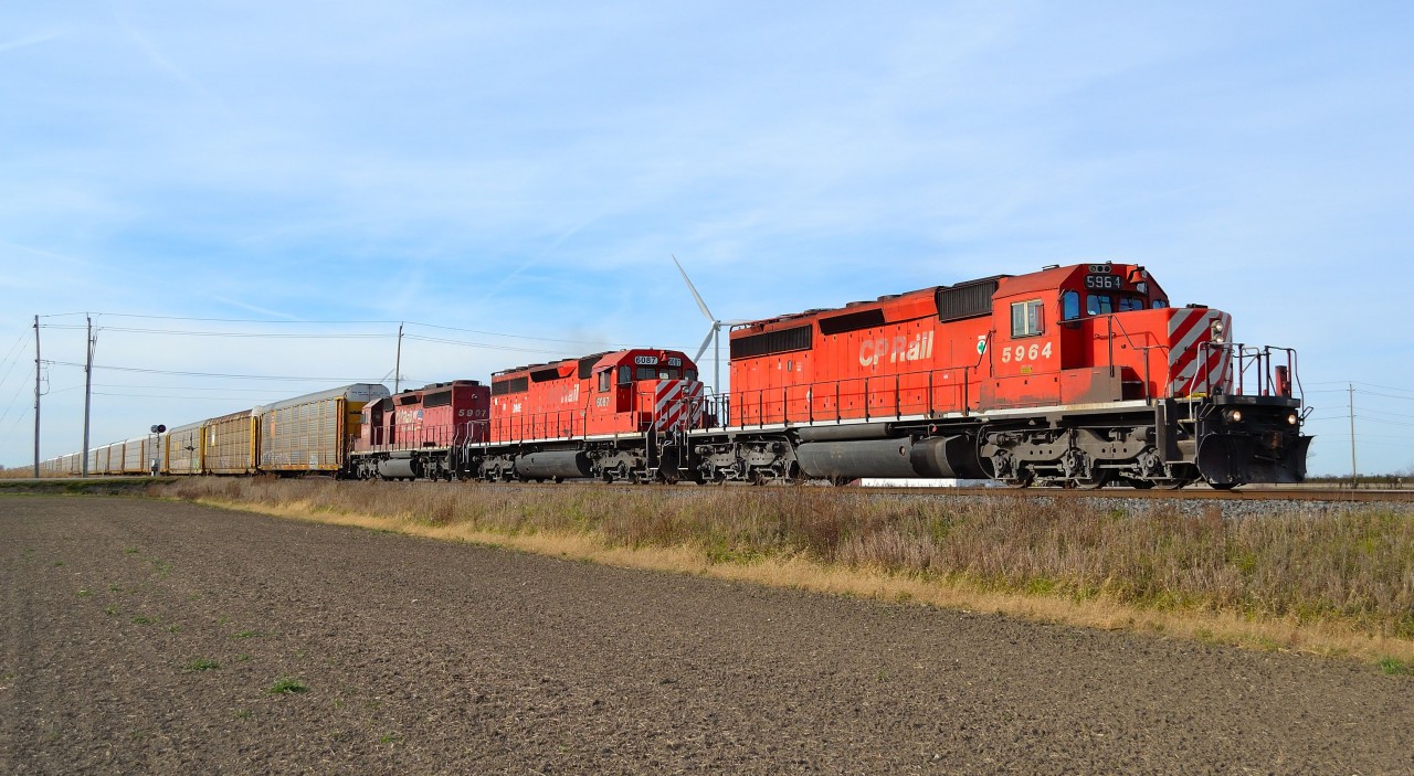 CP 3-240 heads eastbound at Haycroft with a nice all EMD lashup consisting of CP 5964, DME 6087 & CP 5907