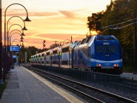 With its marker lights lit, AMT 1368 is pushing AMT 121 westbound after the train makes its stop at Montreal West Station at sunset. For more train photos, check out http://www.flickr.com/photos/mtlwestrailfan/