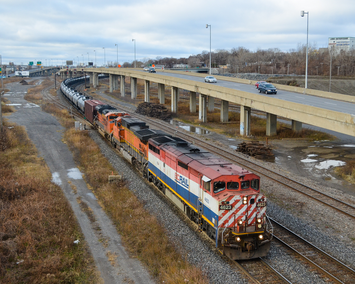 BNSF power a long way from home.... BCOL 4623, BNSF 4011 & BNSF 9190 are the power on a loaded oil train (CN 710) that is heading east after a crew change at Turcot West. Up until recently BNSF power was practically unheard of in Quebec, but is getting more common with the increase in oil trains. CN 710 originated in North Dakota and is bound for the Valero refinery in St-Romuald, Quebec (near Quebec City). For more train photos, check out http://www.flickr.com/photos/mtlwestrailfan/