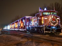 <b>First night of the 2013 U.S. CP Holiday Train.</b> Makings its second stop of the night, CP's U.S. Holiday train makes a stop at Delson, Quebec. Of note is that Delson is named for the Delaware & Hudson - the tracks of D&H subsidiary Napierville Junction ended at Delson (trains would continue on CP's Adirondack Sub). For more train photos, check out http://www.flickr.com/photos/mtlwestrailfan/
