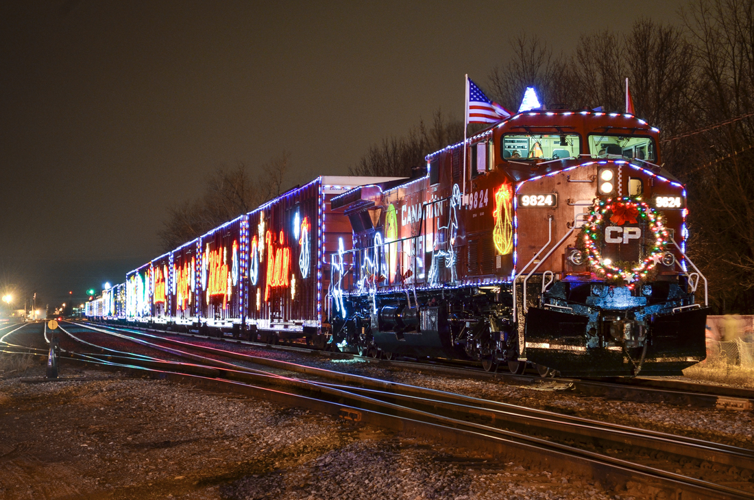 First night of the 2013 U.S. CP Holiday Train. Makings its second stop of the night, CP's U.S. Holiday train makes a stop at Delson, Quebec. Of note is that Delson is named for the Delaware & Hudson - the tracks of D&H subsidiary Napierville Junction ended at Delson (trains would continue on CP's Adirondack Sub). For more train photos, check out http://www.flickr.com/photos/mtlwestrailfan/