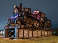 <b>At the entrance to Exporail.</b> After photographing the CP Holiday train nearby, I figured I would try a night shot of this unique steam engine as it has a small amount of Christmas lights. This steam engine was built by Baldwin in 1900 as a 2-4-0T called E.E. Bigge for Nova Scotia Steel & Coal and was not retired until 1962. For more train photos, check out http://www.flickr.com/photos/mtlwestrailfan/