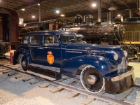This track inspection car was originally built for Dr. H.A. Beatty (brother of CP president Sir Edward Wentworth Beatty) as a regular 1939 Buick Century. In 1947 he donated it to CP, which converted it to the vehicle seen here. According to the information on the placard at Exporail "the original chassis was replaced by a customized frame that includes an autonomous turntable, two railway axles, and flanged wheels.....The original spring suspension was replaced by an elliptic spring system, and an air brake system and a compressor were added to the vehicle." Behind is CP 144, a 4-4-0. For more train photos, check out http://www.flickr.com/photos/mtlwestrailfan/ 