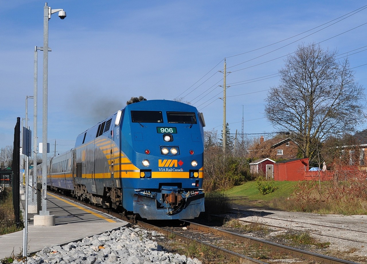 VIA 84 passes the new Acton GO station on its way to Toronto, with 4 LRC coaches and VIA 6438 bringing up the rear. Acton isn't a VIA stop; CN discontinued passenger service here in 1967.