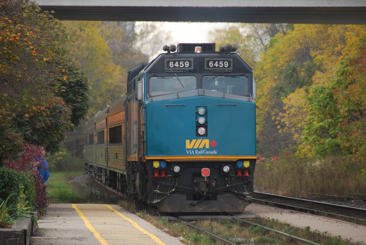VIA 6459 ex. 6403 runs on this "J" train departing Woodstock Ont. with 904 in the lead. 6459 will disconnect in London with half the train and head back East while 904 will continue West to Windsor.