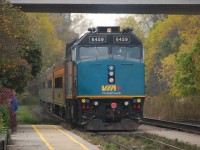 VIA 6459 ex. 6403 runs on this "J" train departing Woodstock Ont. with 904 in the lead. 6459 will disconnect in London with half the train and head back East while 904 will continue West to Windsor. 