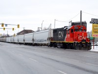 James, I see your 15 cars... and I raise you 2. I couldn't resist posting this picture after seeing James' photo of a 15 car 580 heading down the Burford Spur. On January 6, 2010, CN ran a 17 car train down the Burford, with 7 cars for Ingenia and 10 cars for SC Johnson. I don't know how I managed to get this shot without a single car in the way on Clarence Street. The classic Baker Auto Electric sign has since been replaced with a newer, much more boring one.