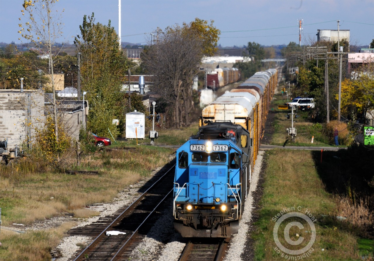 Goderich-Exeter train 431 is about to back into the yard and call it a day after having arrived from Mac Yard with empty autoracks for CP. The interchange is at South Junction (Kitchener) - the junction of the GEXR Huron Park spur and the CP Waterloo Subdivision (Grand River Railway).