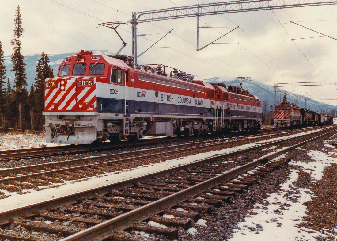 Photo taken by Glen Fisher, my father-in-law. He is is a railway consultant and was involved in the BC Rail Tumbler Ridge electrification during the early 1980s. This shot shows testing of the GF6C locomotives before regular service on the line began. All have since been retired and the line deelectrified.