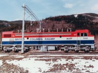 Photo taken by Glen Fisher, my father-in-law. He is is a railway consultant and was involved in the BC Rail Tumbler Ridge electrification during the early 1980s. This shot shows one of the GF6C locomotives before regular service on the line began. All have since been retired and the line deelectrified. Unknown location, please let me know if you have information on the exact location.
