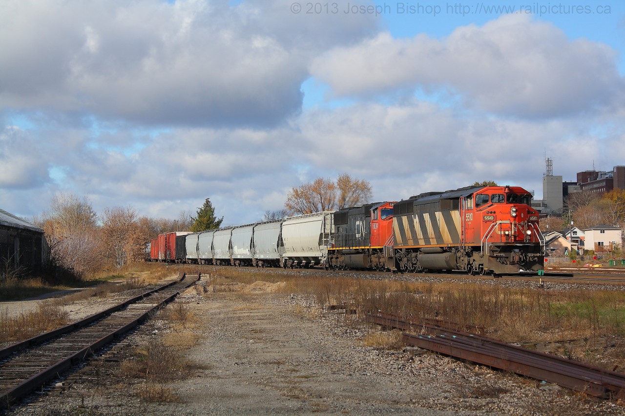 CN 382 rolls through Brantford with a SD60F on the point.  This was the third freight of the morning, the first being U710 with a BNSF visitor trailing.  Those two freights made for a good morning.