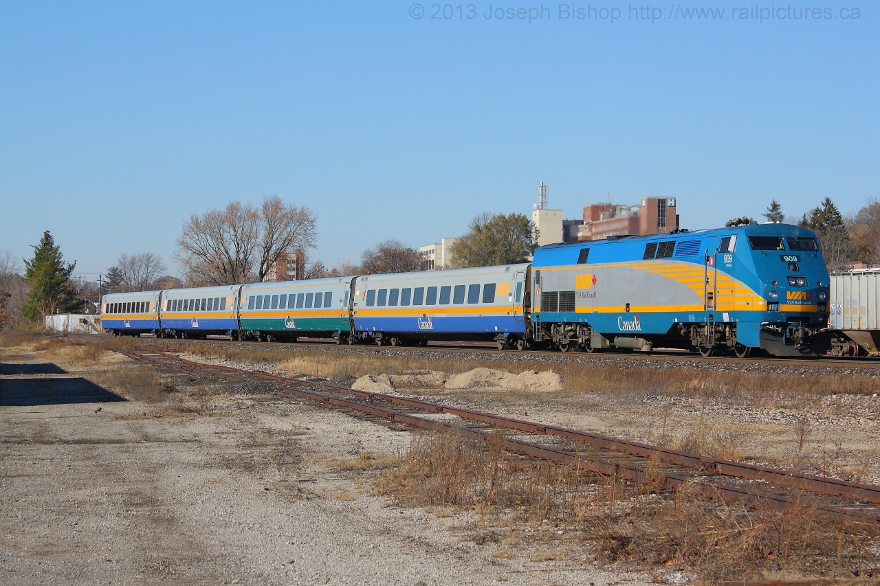 Via 72 cruises into Brantford for its station stop with 909 and 4 LRC.  The second car is one of the LRC cars that has been refurbished.