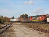 CN 2425 leads 382 through Brantford with the help of two other GE's.