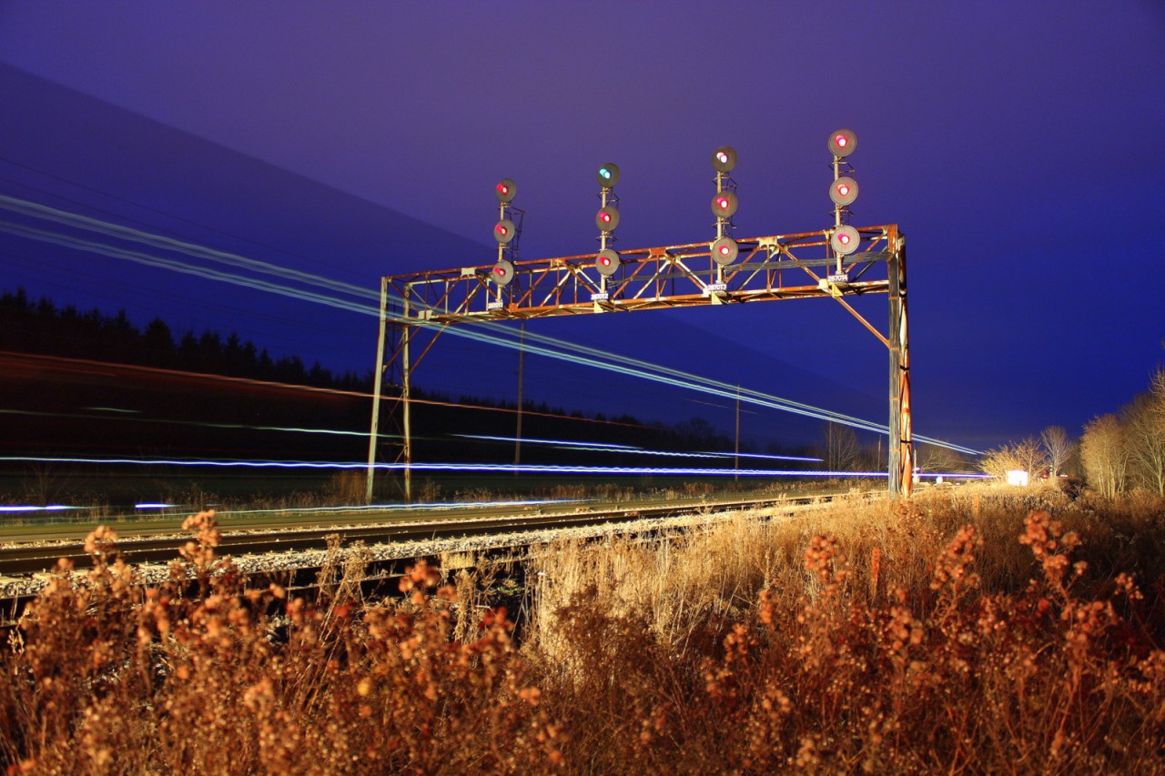 CN stack train rolls through the old signal bridge just out side Newcastle !
