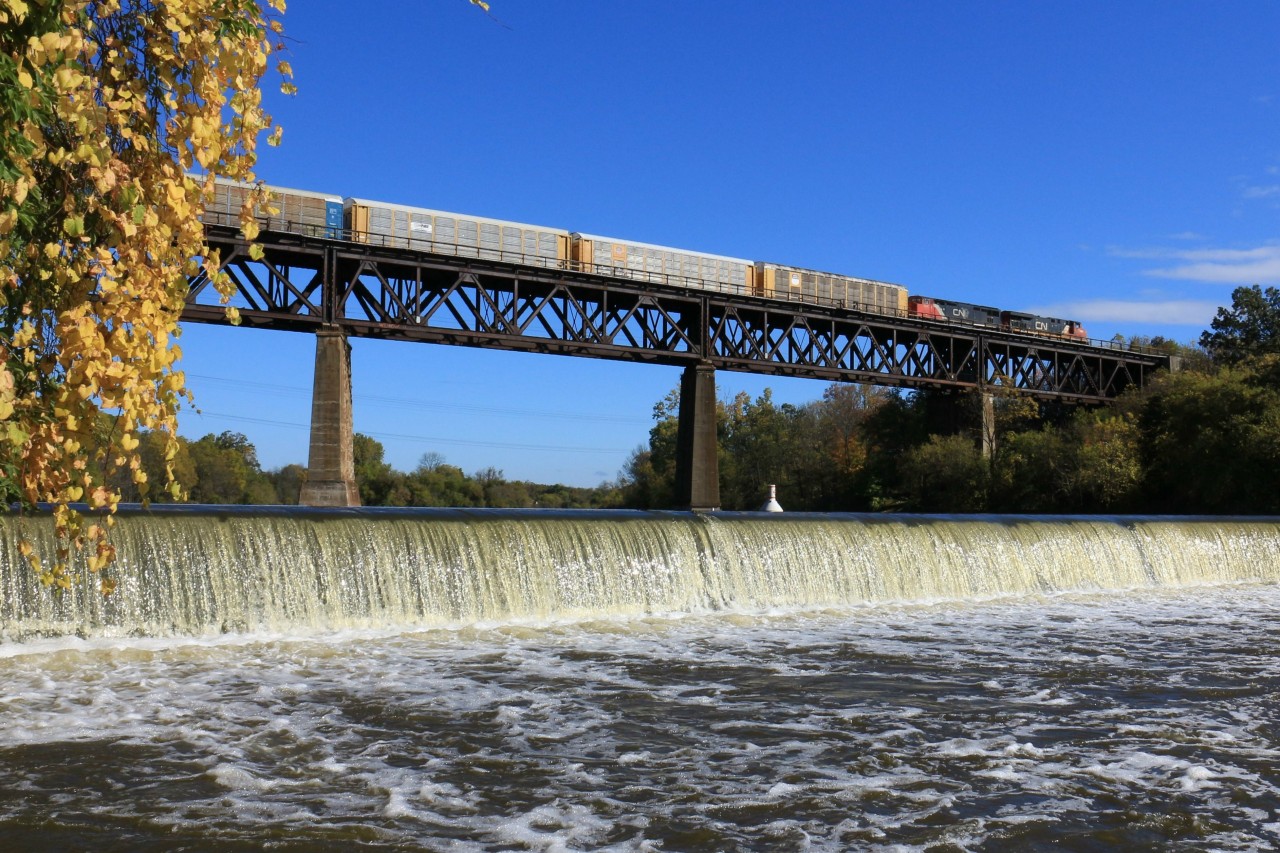It's Thanksgiving Monday and an eastbound C.N. train soars over the Grand River at Paris, Ont.