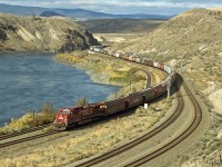 CPR grain train switching from CPR to CNR mainline at Basque on the Thompson River.  All trains run west on CNR and east on CPR between here and Mission B.C.