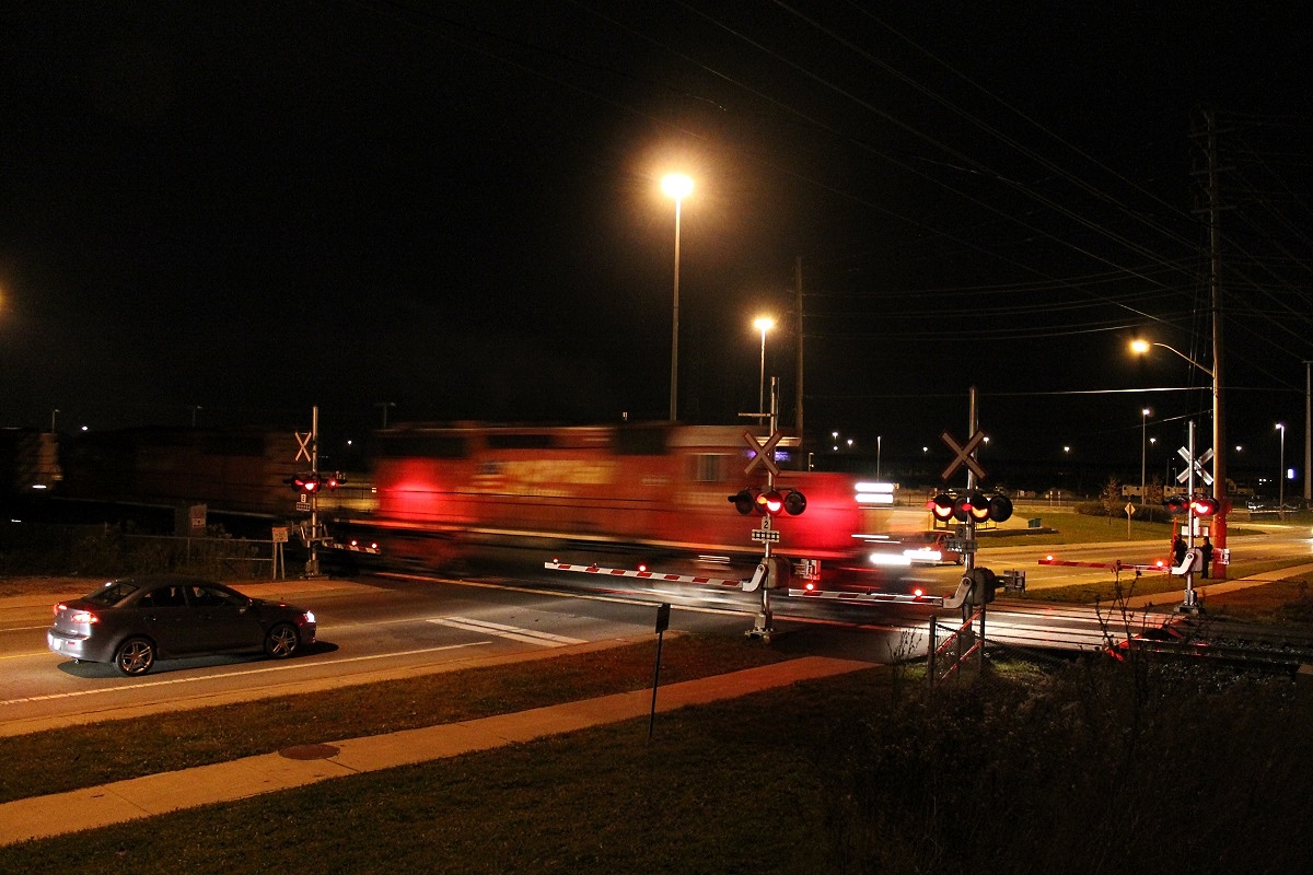 CP 5857 leads a decent trio of SD40's on the Expressway which was a surprise.
