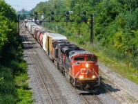 CN 394 is leaving Taschereau Yard and is bound for Richmond, Quebec and interchange with the Saint Lawrence & Atlantic. Power is CN 8953 & CN 2271. For more train photos, check out http://www.flickr.com/photos/mtlwestrailfan/