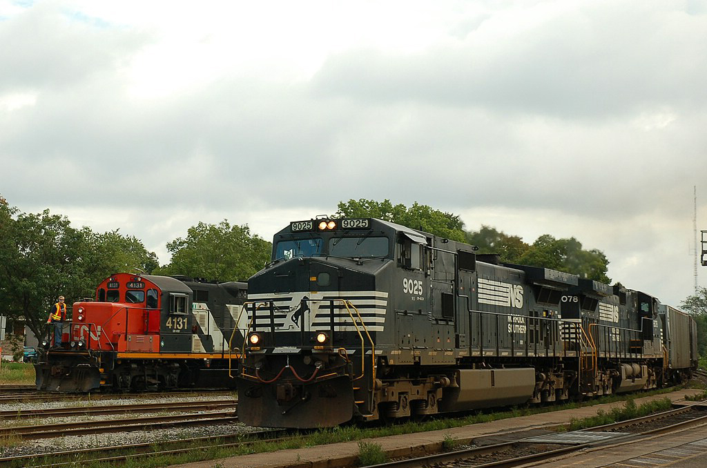 The one and only NS 327 passing by Brantford with a pair of NS C40-9W's