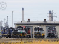 <b>The ex CN Roundhouse</b> is busy again - Lambton Diesel Services of Sarnia has many units shown on the property, many available for lease or works in progress. Including: LDSX 0176 (Former GMD 0069), LDSX 0178 (ex-CN), LDSX 0179 (ex-SOR/CN), CCGX 4016 (ex-CN), LDSX 1251 (ex-Lasco Steel, exx-CN), CN 750X (Work in progress). Inside the shops is GEXR 3030 (ex-RMPX/CN 9431, a GP40-2W - Paint and repairs) and CSXT 2757 (Sideswipe repairs).
