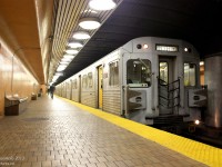 Heading north on the Spadina line to Downsview, a train of mid-70's era Hawker Siddeley Canada H5's with TTC 5724 in the lead pauses to unload passengers at Dupont Subway Station. <br><br> Opened in 1978, the Spadina line differed from the monotone Bloor-Danforth in that it featured a variety of different station architectural designs; Dupont is notable for all of its curved edges, round bubble lights, and giant murals further down on both sides of the station platforms. The once-mighty H5 fleet, long the backbone of the Yonge-University-Spadina line, is now retired, and most have either been cut up for scrap in Hamilton or trucked to New York for refurbishing for a Nigerian light rail line in Lagos. <br><br> <b><u>More along the Spadina Line:</u></b><br> A new Toronto Rocket at Dupont: <a href=http://www.railpictures.ca/?attachment_id=10476><b>http://www.railpictures.ca/?attachment_id=10476</b></a><br> The half-outdoors Eglinton West Station: <a href=http://www.railpictures.ca/?attachment_id=3833><b>http://www.railpictures.ca/?attachment_id=3833</b></a><br> Lawrence West Subway Station: <a href=http://www.railpictures.ca/?attachment_id=203><b>http://www.railpictures.ca/?attachment_id=203</b></a><br> Glencairn Station and new TR's: <a href=http://www.railpictures.ca/?attachment_id=1982><b>http://www.railpictures.ca/?attachment_id=1982</b></a><br> Riding the train south at Dupont: <a href=http://www.railpictures.ca/?attachment_id=7743><b>http://www.railpictures.ca/?attachment_id=7743</b></a><br> Yorkdale Subway Station from the outside: <a href=http://www.railpictures.ca/?attachment_id=816><b>http://www.railpictures.ca/?attachment_id=816</b></a>