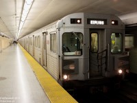 Time stops for no one, and along the mundane Bloor-Danforth line it's touch n' go at each station: stop, open the doors, people exit the train, people enter the train, close the doors and hurry to the next station, often in less than a minute's time. It's just another one of those moments in time pictured here: with the doors closed, passengers leaving for the exits and barely a second to take a photo, TTC 5816 leads a set of orange-doored H6 cars westbound to Kipling, right before departing Royal York Subway Station and making the jump to Islington.