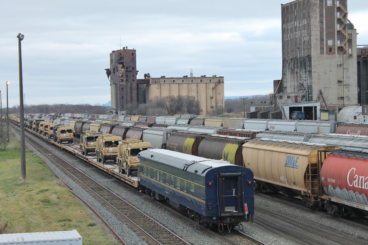 CP train 118 passed through Thunder Bay this afternoon with a string of British army equipment on flatcars eastbound from Alberta.  Tioga Pass - RPCX 800693 - brings up the rear as the train travels along the mainline adjacent to CP’s Westfort yard.