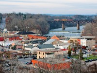 A change of colour from the usual boring CN power, BCOL4623 leads BNSF4011 on a U71131 15 through Paris. 