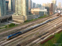 <b>Just Another Day</b>. <br><br> It's 6:55am, and all over downtown Toronto, people are getting up, having breakfast, and leaving their condos for another workday in the big city. For some it's just a 5-minute walk to the office, others a 15 minute subway or streetcar ride, and still others a drive up the Don Valley Parkway or Gardiner Expressway out of the downtown core to Etobicoke, Scarborough or North York. <br><br> The people on this train however, have risen hours before to do their morning rituals, and upon completion headed downtown to board their train at Union Station. Destined for business or pleasure outside the city, they're settled down in the plush LRC seating as their train makes its usual morning departure, on time, from the big city. It's actually two trains: the lead P42 locomotive is hauling train #40 destined for Ottawa, while coupled behind in a "J-train" consist is #52 for Montreal. While an odd practice, this is completely normal for the two trains scheduled to depart at the same time. At Brockville the train will be split, with one half bound for Canada's capital, and the other for Canada's second-largest city.