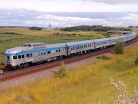 VIA's "Canadian" rounds the s curve at Arrow River as it heads for Rivers and points east.