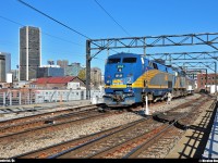 <B>Montréal Skyline!</B> After leaving the Central station in Montreal downtown few minutes ago, VIA #57 passes beside the Montreal panorama at near the Wellington tower.